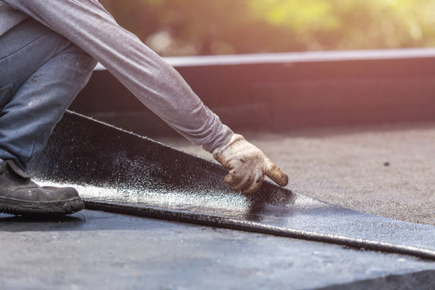 Professional Basement Waterproofing technician working in Morley, MI